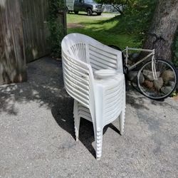 Nine Outdoor Stackable Chairs