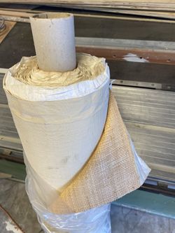 7” thick X 4ft. wide roll of grasscloth. 300.00