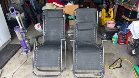 Pair of zero gravity outdoor chairs