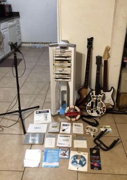Wii 17 games Game tower 3 guitars microphone lot Golflinks wilmot area