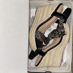 Women’s size 7 Blowfish Malibu black wedge slip on sandals