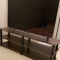 TCL 43 inch size TV 4K and wooden tv stand 
