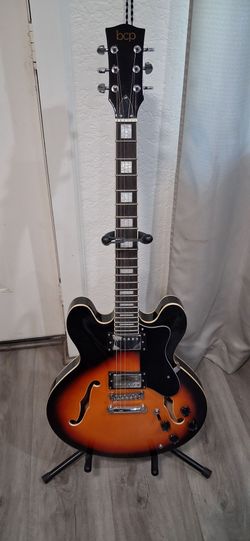 BCP Semi - Hollow body Electric guitar. Good condition. good sound. stand included.
