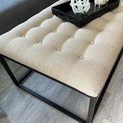 beige tufted ottoman, coffee table, end of bed ottoman Table 