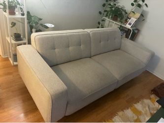 Cute and comfortable grey couch