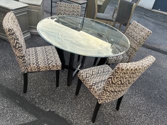 Round Glass Dining Table with 4 Upholstered Chairs