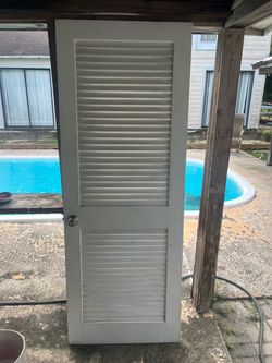 Interior door with slats