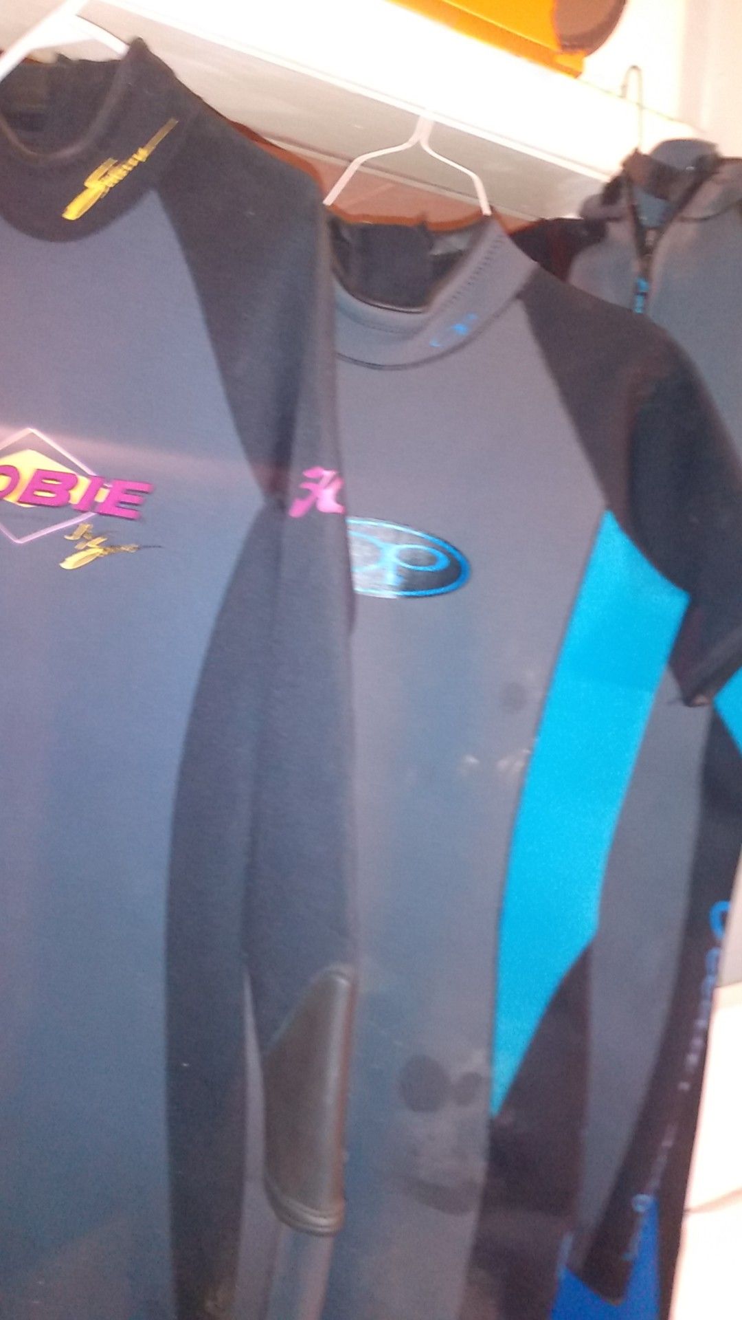 Family of 4 wetsuits