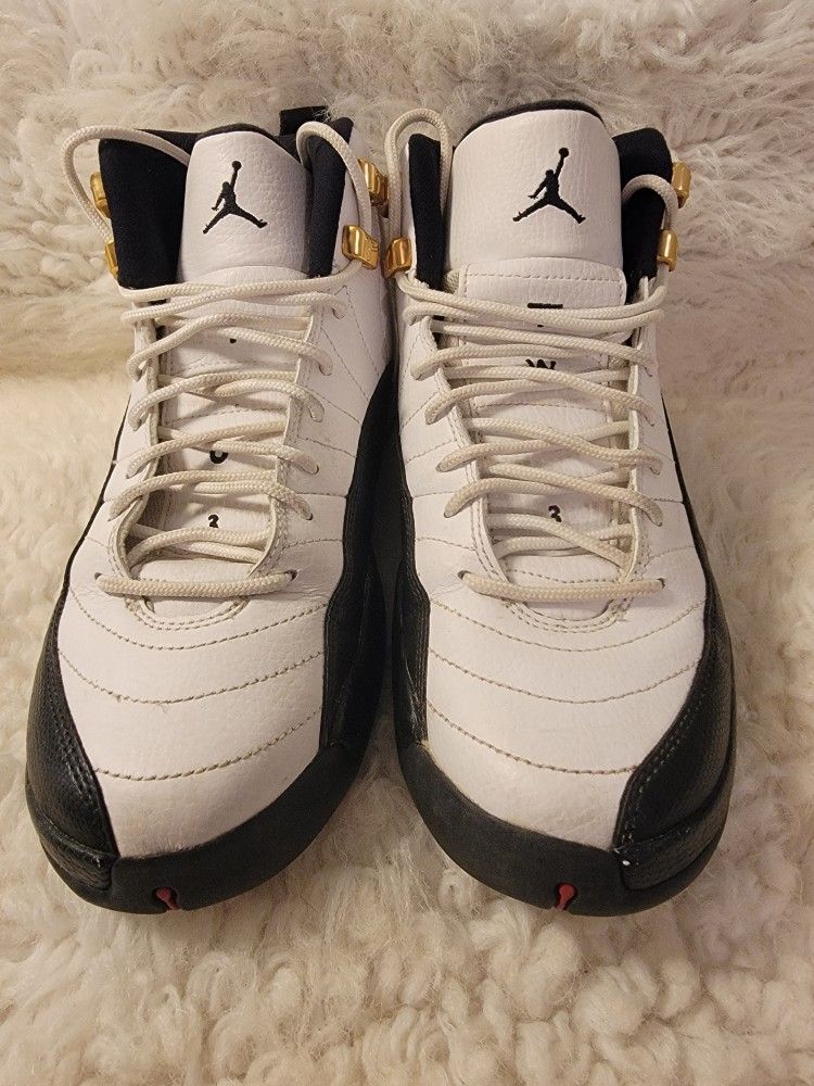 Authentic Pair of Nike Air Jordan 12 Retro "Taxi" sneakers. 2013 (153265-125) Women's Size 6.5