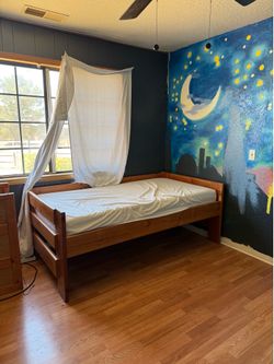 Solid wood bunkbeds. Comes with stair ladder extra storage.
