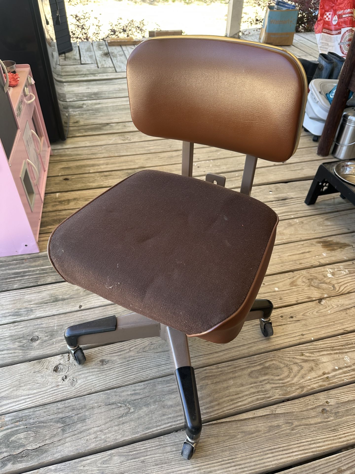 Vintage mid century modern rolling chair