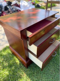Cherry wood nightstand with drawers