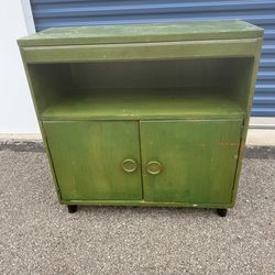 vintage green-painted wooden cabinet/shelf 32” wide  13” deep  32 1/2” tall