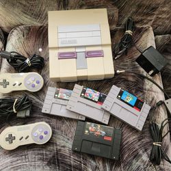 Super Nintendo SNES W Two Controllers and 4 Games "In Working Condition"