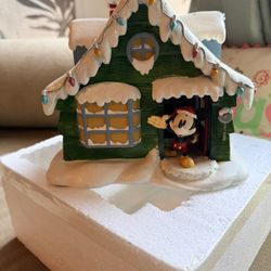 Disney Mickey Mouse illuminated holiday village collectible. 