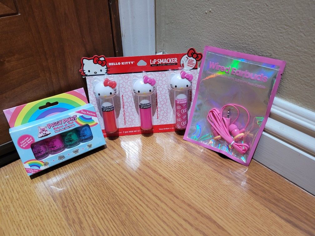 HELLO KITTY LIP SNEAKER! LIP BALM!  PIGGY PAINT FOR TOENAILS NON-TOXIC! WIRED EARBUDS! BRAND NEW ALL!