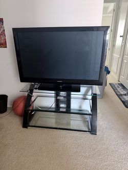 Samsung Flat Screen TV with Glass TV Stand