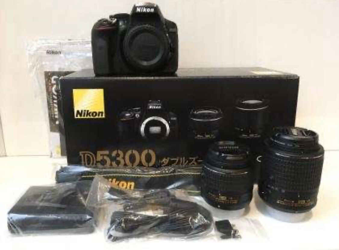Nikon D5300 DX with 18-55mm and 50mm f/1.8G Nikkor lens - $550