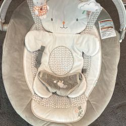Ingenuity Twinkle Tails Bouncer plush fabrics to keep baby cozy & calm