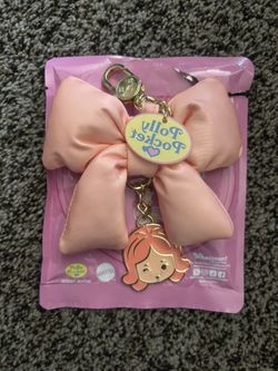 Polly Pocket™ Mystery Bag Puffy Bow Bag Charm orange 