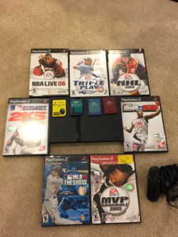 PS2 with 4 memory cards and 7 games