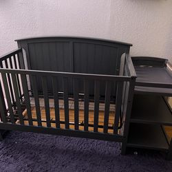 Gray Crib With Shelves