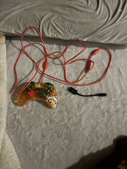 Nintendo controller see through works fine I’m willing to negotiate the price