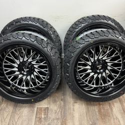 NEW 22x12 gloss black/milled fittipaldi wheels wrapped in AMP AT 33x12.50r22 tires