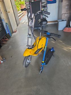 Two electric scooters  24 and 12 volts