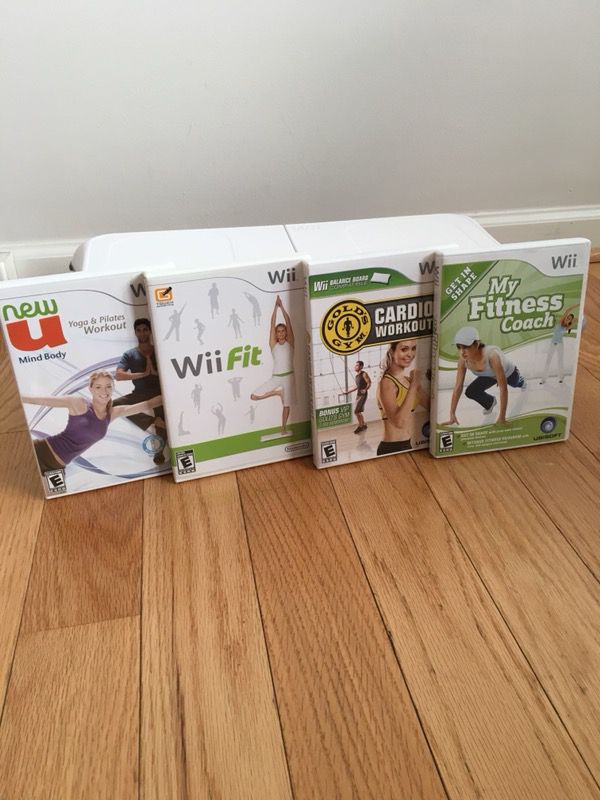 Wii Fit Board with feet and fitness games