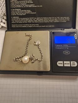 Sterling silver pearl infinity bracelet
