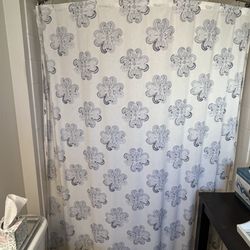 Blue and white shower curtain