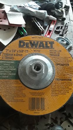 Grinding disc 7 inch by 1/4 DeWalt slightly used $6