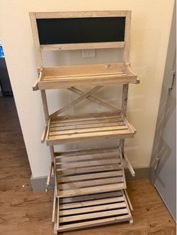 Foldable shelves with chalk board at the top