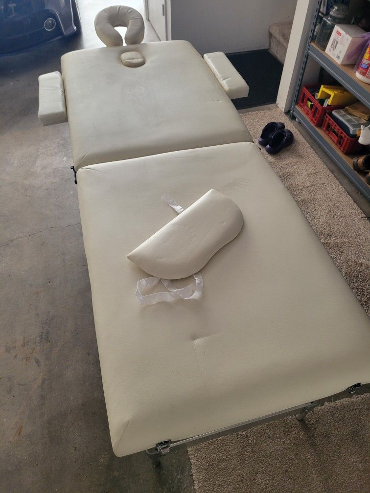 Massage table