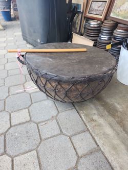 +6                    This is a traditional kettle drum, often identified as a Nagara drum from India or similar tribal drums from Africa.