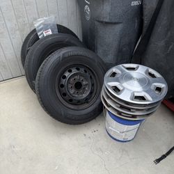 3 Tires And Toyota Rims Covers 