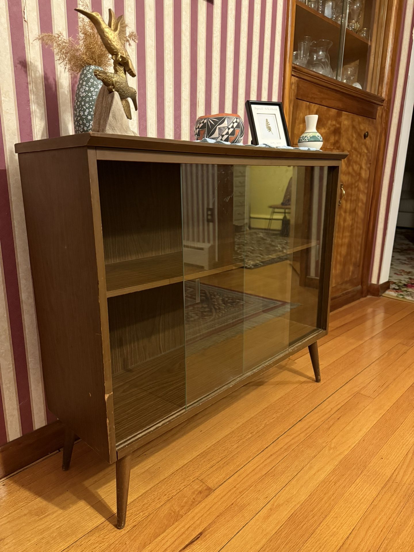 Vintage cabinet with sliding glass doors