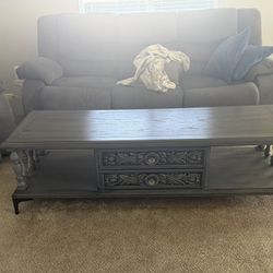 Dark grey coffee table carved details