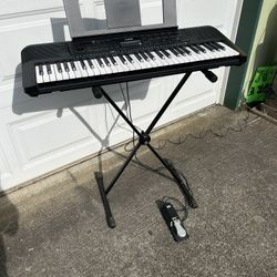 Yamaha E273 Keyboard - excellent w p/s, music stand Keyboard Stand, and sustain pedal.  Everything works as it should.  Lots of voices and sounds.  