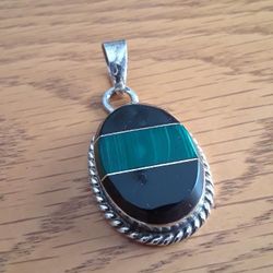 Vintage jewelry.  Silver pendant