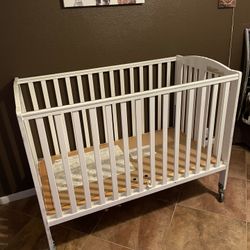 Roll Away Crib With Metal Wheels
