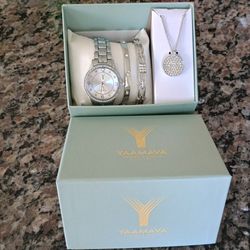 Women's watch, bracelets and necklace