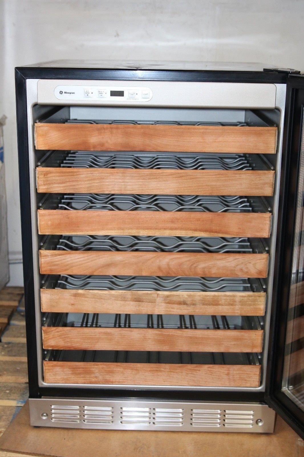 A GE MONOGRAM 57 BOTTLE CAPACITY UNDER THE COUNTER WINE COOLER