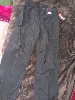 Movable black windbreaker pants