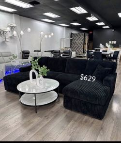 Stylish Sectional sofa with pull -out bed & double storage  black fur- like jumbo corduroy