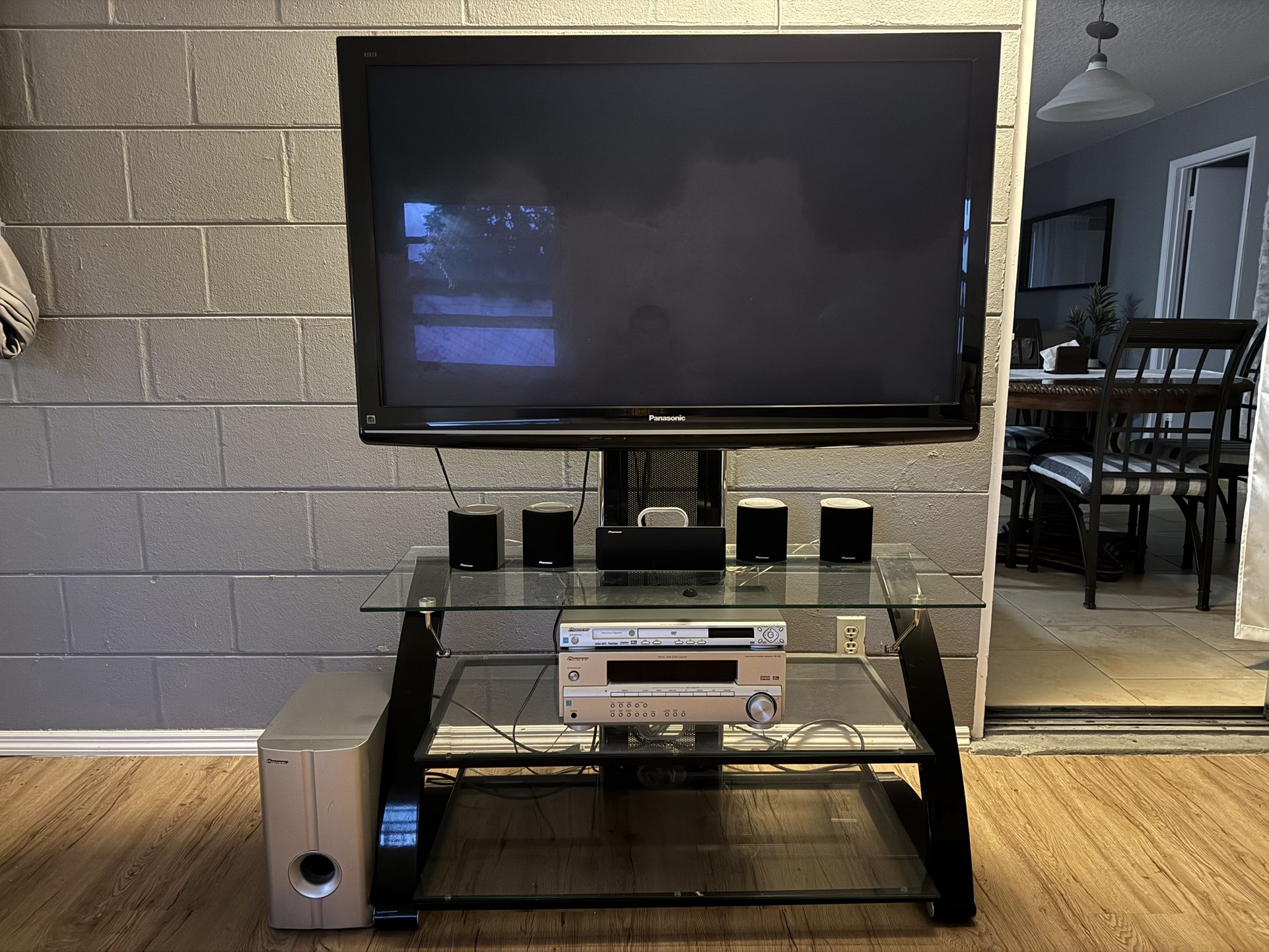 TV Stand, TV, Home Theater And Sofa