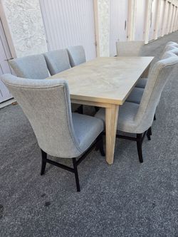Beautiful Dining Set Table with 8 Captain  Chairs