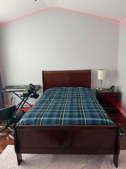Full bed with mattress and dresser