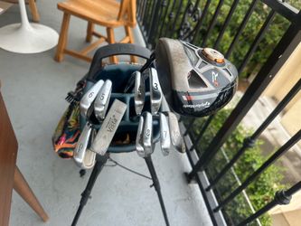Complete golf club set, travel bag, shoes, and more!  o